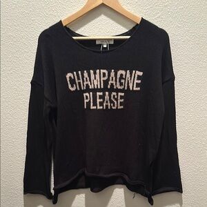 Miracle Black and Gold Boat Neck long Sleeve Sweater. Split hem.